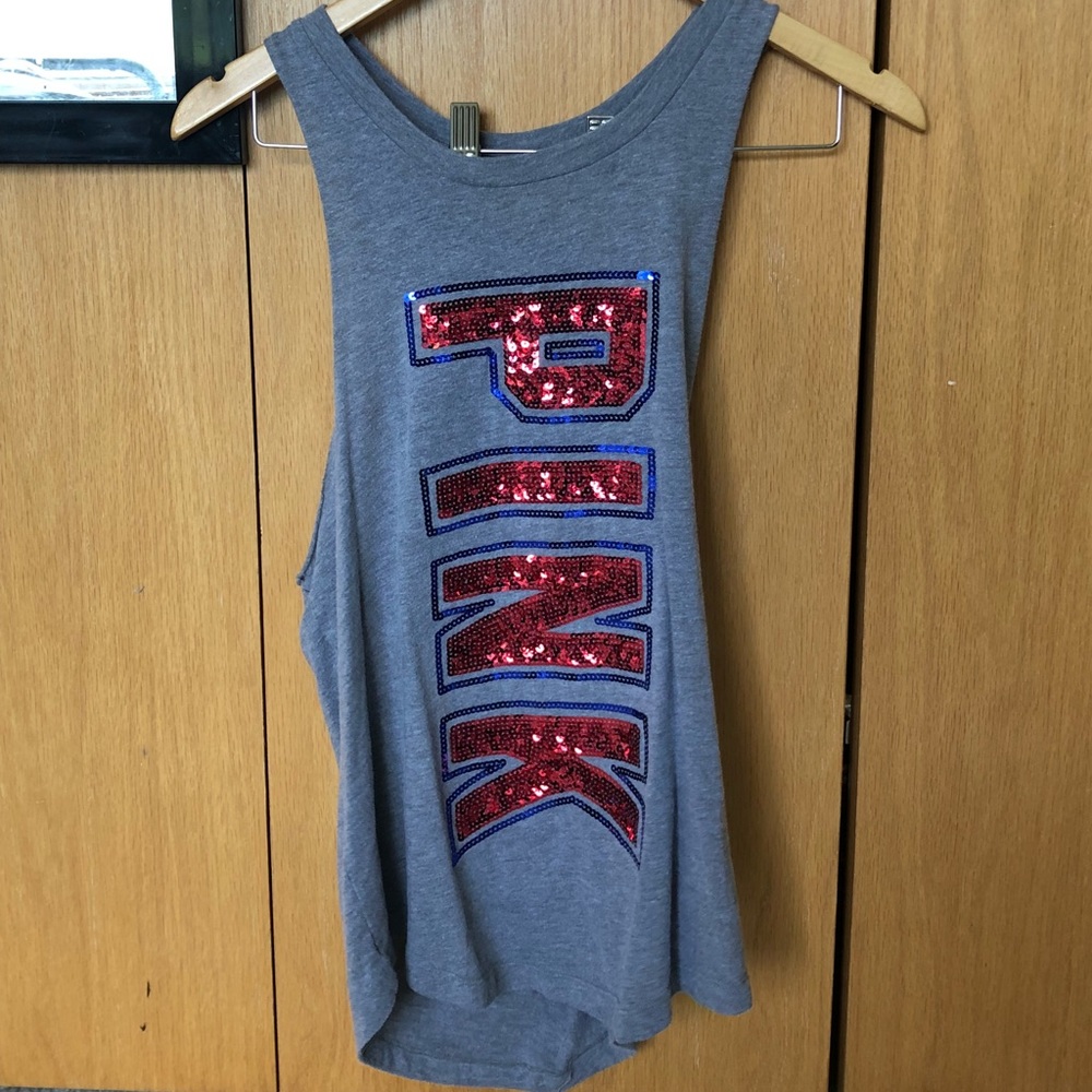 XS Pink/Victoria Secret tank with open sides.